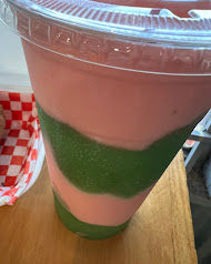 Layered strawberry and green frozen daiquiri